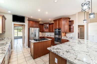 Huge 6 Bedroom, Full Brick Home located just off the 3rd Tee Box on Triple Crown Country Club in Kentucky - for sale on GolfHomes.com, golf home, golf lot