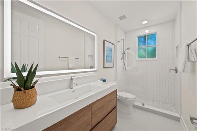 Come experience ultimate privacy in this stunning 1st floor on Tiburon Golf Club in Florida - for sale on GolfHomes.com, golf home, golf lot