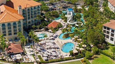 Come experience ultimate privacy in this stunning 1st floor on Tiburon Golf Club in Florida - for sale on GolfHomes.com, golf home, golf lot