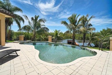 Welcome to this magnificent 2003-built executive home, perfectly on Bayou Golf Club in Florida - for sale on GolfHomes.com, golf home, golf lot