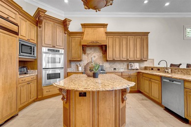 Welcome to this magnificent 2003-built executive home, perfectly on Bayou Golf Club in Florida - for sale on GolfHomes.com, golf home, golf lot