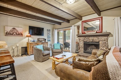 Step onto the spacious deck and take in breathtaking views of on Pinetop Lakes Golf and Country Club in Arizona - for sale on GolfHomes.com, golf home, golf lot