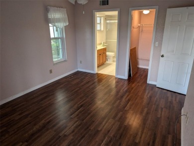 Golf course living at its finest! This charming first-floor on Deep Creek Golf Club in Florida - for sale on GolfHomes.com, golf home, golf lot