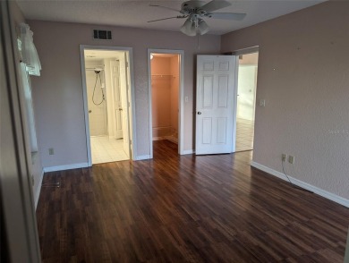 Golf course living at its finest! This charming first-floor on Deep Creek Golf Club in Florida - for sale on GolfHomes.com, golf home, golf lot