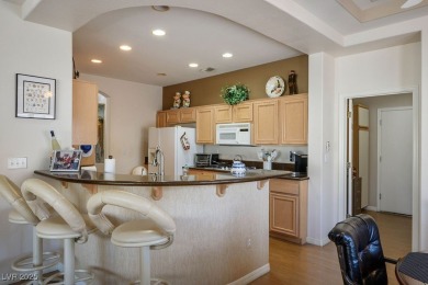 This beautifully maintained 2,210 sq. ft. Belmont model offers 3 on Highland Falls Golf Club in Nevada - for sale on GolfHomes.com, golf home, golf lot