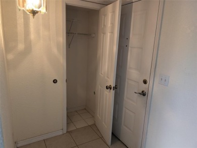 Golf course living at its finest! This charming first-floor on Deep Creek Golf Club in Florida - for sale on GolfHomes.com, golf home, golf lot