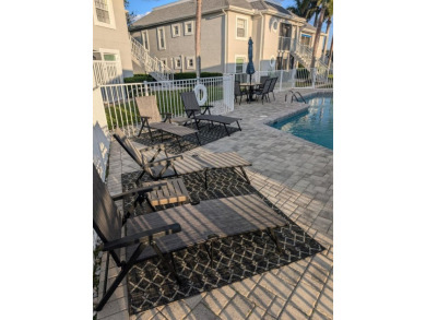 Golf course living at its finest! This charming first-floor on Deep Creek Golf Club in Florida - for sale on GolfHomes.com, golf home, golf lot