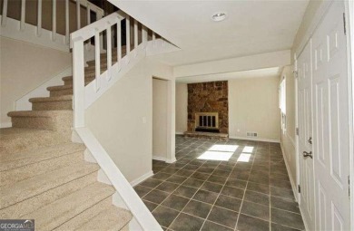 This charming 4-bedroom 3-bath home is perfect for a growing on Hidden Hills Country Club in Georgia - for sale on GolfHomes.com, golf home, golf lot