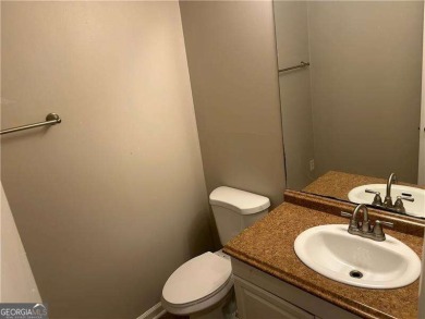 This charming 4-bedroom 3-bath home is perfect for a growing on Hidden Hills Country Club in Georgia - for sale on GolfHomes.com, golf home, golf lot