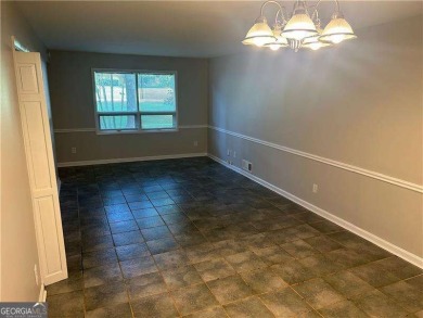 This charming 4-bedroom 3-bath home is perfect for a growing on Hidden Hills Country Club in Georgia - for sale on GolfHomes.com, golf home, golf lot