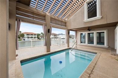 Welcome to this stunning canal-front home in the highly on Palmilla Beach Golf Club in Texas - for sale on GolfHomes.com, golf home, golf lot
