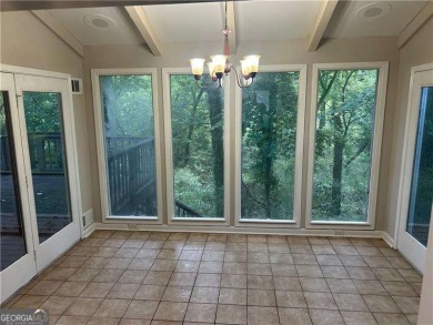 This charming 4-bedroom 3-bath home is perfect for a growing on Hidden Hills Country Club in Georgia - for sale on GolfHomes.com, golf home, golf lot