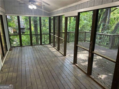 This charming 4-bedroom 3-bath home is perfect for a growing on Hidden Hills Country Club in Georgia - for sale on GolfHomes.com, golf home, golf lot