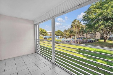 Beautiful 2-bedroom, 2 bathroom condo in the sought-after on Wynmoor Golf Course in Florida - for sale on GolfHomes.com, golf home, golf lot