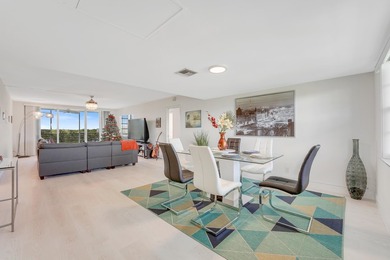 Experience elevated living in this stunning top-floor sanctuary on Palm-Aire Country Club and Resort - The Oaks in Florida - for sale on GolfHomes.com, golf home, golf lot