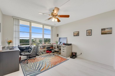 Experience elevated living in this stunning top-floor sanctuary on Palm-Aire Country Club and Resort - The Oaks in Florida - for sale on GolfHomes.com, golf home, golf lot