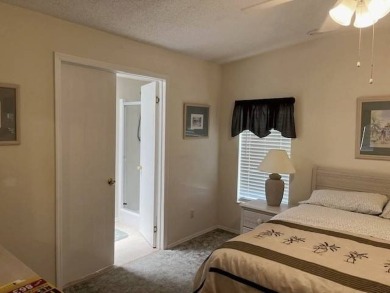 Charming and Updated Home - with 2 Bedroom, 2 Bath, 1,200 Sq Ft on Four Lakes Golf Club in Florida - for sale on GolfHomes.com, golf home, golf lot