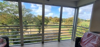 Beautifully renovated 2 bedroom 2 bath condo overlooking on Palm-Aire Country Club and Resort - Palms in Florida - for sale on GolfHomes.com, golf home, golf lot