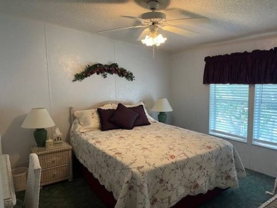 Charming and Updated Home - with 2 Bedroom, 2 Bath, 1,200 Sq Ft on Four Lakes Golf Club in Florida - for sale on GolfHomes.com, golf home, golf lot