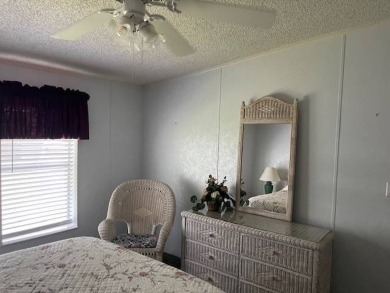 Charming and Updated Home - with 2 Bedroom, 2 Bath, 1,200 Sq Ft on Four Lakes Golf Club in Florida - for sale on GolfHomes.com, golf home, golf lot