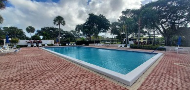 Beautifully renovated 2 bedroom 2 bath condo overlooking on Palm-Aire Country Club and Resort - Palms in Florida - for sale on GolfHomes.com, golf home, golf lot