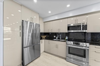 Step into elegance in this fully remodeled, turnkey residence on Turnberry Isle Resort and Club in Florida - for sale on GolfHomes.com, golf home, golf lot