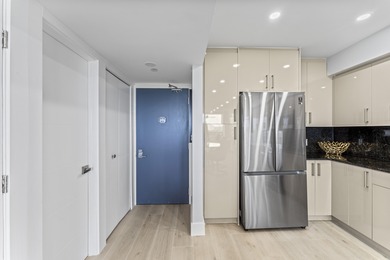 Step into elegance in this fully remodeled, turnkey residence on Turnberry Isle Resort and Club in Florida - for sale on GolfHomes.com, golf home, golf lot