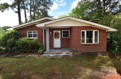 Welcome Home! Charming 2-bedroom, 2 full bath home sitting on on Rolling Hills Golf Club in North Carolina - for sale on GolfHomes.com, golf home, golf lot
