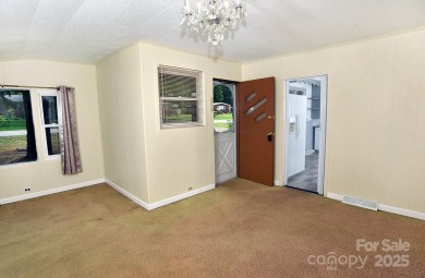 Welcome Home! Charming 2-bedroom, 2 full bath home sitting on on Rolling Hills Golf Club in North Carolina - for sale on GolfHomes.com, golf home, golf lot