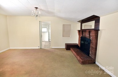 Welcome Home! Charming 2-bedroom, 2 full bath home sitting on on Rolling Hills Golf Club in North Carolina - for sale on GolfHomes.com, golf home, golf lot