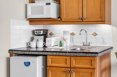 Located in Lasata at Sandestin, this charming ground-floor on Sandestin Golf and Beach Resort - Raven in Florida - for sale on GolfHomes.com, golf home, golf lot