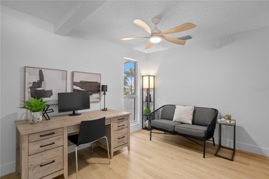 The ultimate Live-Work-Play lifestyle awaits in this beautifully on Isla Del Sol Yacht and Country Club in Florida - for sale on GolfHomes.com, golf home, golf lot