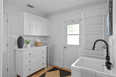 The ultimate Live-Work-Play lifestyle awaits in this beautifully on Isla Del Sol Yacht and Country Club in Florida - for sale on GolfHomes.com, golf home, golf lot