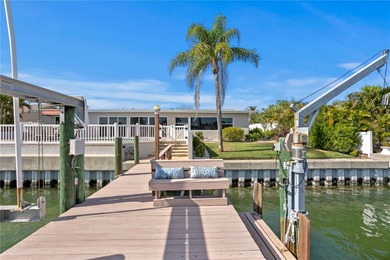 The ultimate Live-Work-Play lifestyle awaits in this beautifully on Isla Del Sol Yacht and Country Club in Florida - for sale on GolfHomes.com, golf home, golf lot
