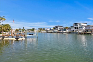 The ultimate Live-Work-Play lifestyle awaits in this beautifully on Isla Del Sol Yacht and Country Club in Florida - for sale on GolfHomes.com, golf home, golf lot