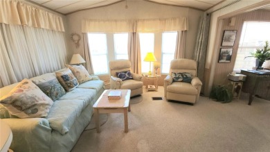 WELL KEPT CHARIOT MOBILE HOME IN ACTIVE 55+ COMMUNITY! One on River Run Golf Links in Florida - for sale on GolfHomes.com, golf home, golf lot