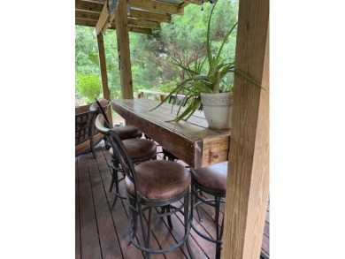 This private and peaceful lakefront home is located in the piney on Pine Dunes Golf Course in Texas - for sale on GolfHomes.com, golf home, golf lot