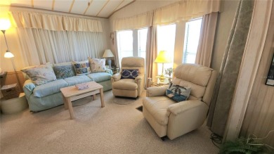 WELL KEPT CHARIOT MOBILE HOME IN ACTIVE 55+ COMMUNITY! One on River Run Golf Links in Florida - for sale on GolfHomes.com, golf home, golf lot