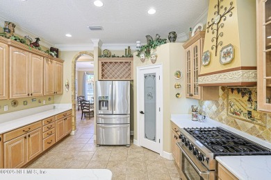 A custom built POOL home on close to 1/2 acre in the wooded area on Magnolia Point Golf and Country Club in Florida - for sale on GolfHomes.com, golf home, golf lot