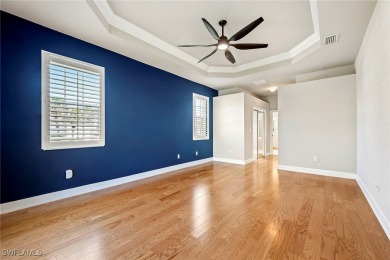 This stunning three-bedroom, 2.5-bath home in Crown Colony on Crown Colony Golf and Country Club in Florida - for sale on GolfHomes.com, golf home, golf lot