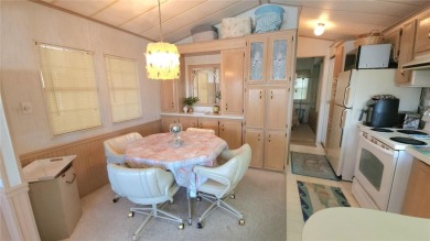 WELL KEPT CHARIOT MOBILE HOME IN ACTIVE 55+ COMMUNITY! One on River Run Golf Links in Florida - for sale on GolfHomes.com, golf home, golf lot