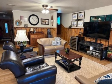This private and peaceful lakefront home is located in the piney on Pine Dunes Golf Course in Texas - for sale on GolfHomes.com, golf home, golf lot