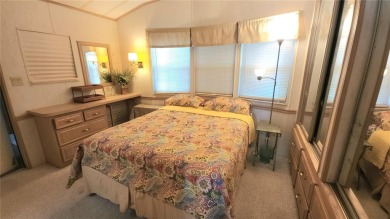 WELL KEPT CHARIOT MOBILE HOME IN ACTIVE 55+ COMMUNITY! One on River Run Golf Links in Florida - for sale on GolfHomes.com, golf home, golf lot