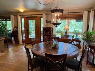 This private and peaceful lakefront home is located in the piney on Pine Dunes Golf Course in Texas - for sale on GolfHomes.com, golf home, golf lot