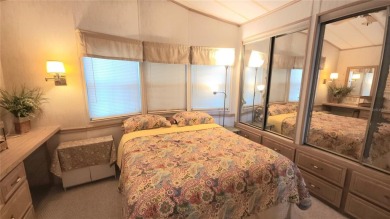 WELL KEPT CHARIOT MOBILE HOME IN ACTIVE 55+ COMMUNITY! One on River Run Golf Links in Florida - for sale on GolfHomes.com, golf home, golf lot
