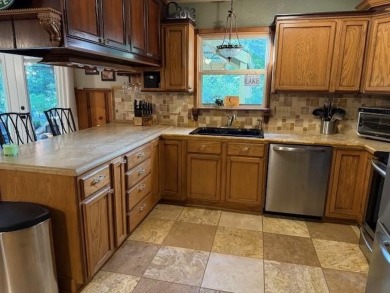 This private and peaceful lakefront home is located in the piney on Pine Dunes Golf Course in Texas - for sale on GolfHomes.com, golf home, golf lot