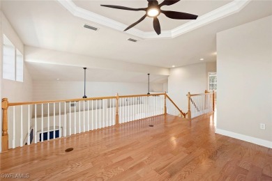 This stunning three-bedroom, 2.5-bath home in Crown Colony on Crown Colony Golf and Country Club in Florida - for sale on GolfHomes.com, golf home, golf lot