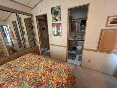 WELL KEPT CHARIOT MOBILE HOME IN ACTIVE 55+ COMMUNITY! One on River Run Golf Links in Florida - for sale on GolfHomes.com, golf home, golf lot