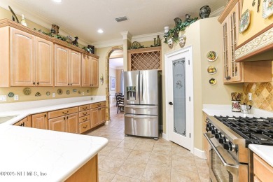 A custom built POOL home on close to 1/2 acre in the wooded area on Magnolia Point Golf and Country Club in Florida - for sale on GolfHomes.com, golf home, golf lot