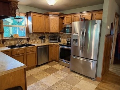 This private and peaceful lakefront home is located in the piney on Pine Dunes Golf Course in Texas - for sale on GolfHomes.com, golf home, golf lot